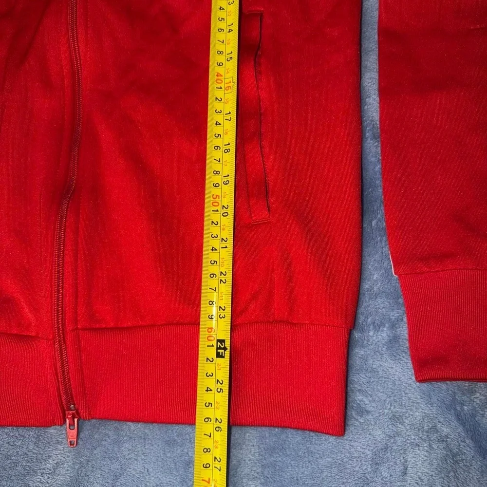 Adidas Originals red track jacket with white stripes
